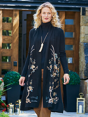 Image of a woman wearing the floral black Ava Embroidered Cardigan